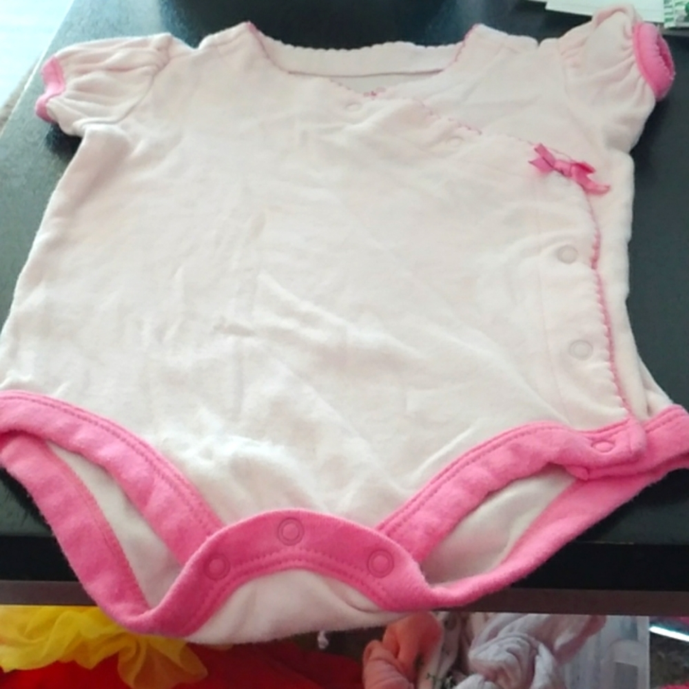100 % cotton pink onepiece with side snaps, size 6-9mos. By Baby Sprockets.